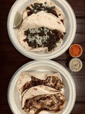 Two sausage and two fajita tacos with fresh onions and cilantro.