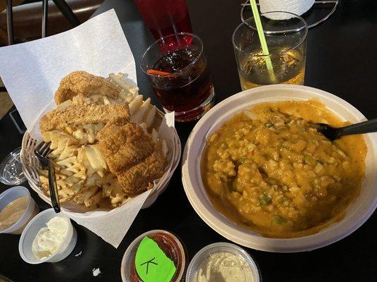 Catfish & Waffle Fries with Crown & Coke. Crawfish Étouffée with Woodford on the rocks!