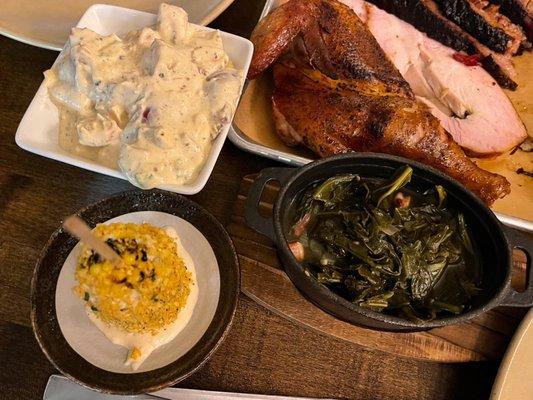 Potato salad, Mexican street corn, and collard greens