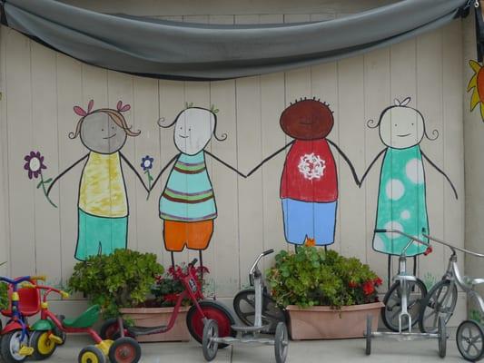 Mural on the school yard and some of the bikes