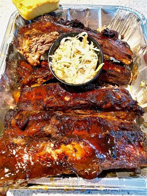 One order of Beef ribs - 7 huge ribs plus you you get 2 sides for a mere $25.