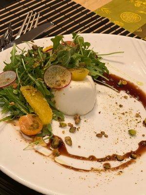 Fresh burrata with local greens salad.