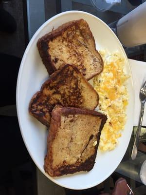 French toast and scrambled eggs with cheese