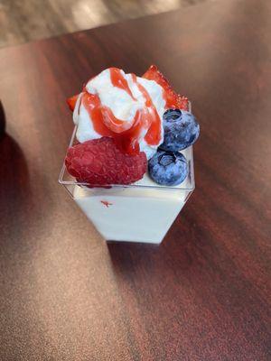 Berries and cream dessert. The creamy base is almost a mousse consistency. So delicious