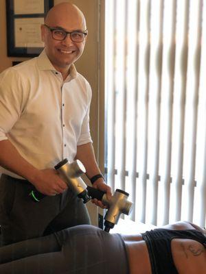 Dr. Walter Fermin treating with Hypervolt Therapy