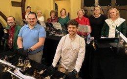 Handbell choir playing on Christmas Eve