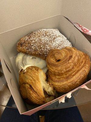 Apple Turnover, Orange Hazelnut Pinwheel, Cinnamon Roll, and Chocolate Croissant