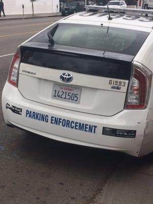 This parking enforcer is a creep. He bullied a mother while she was getting her toddler in the car