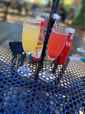 Peach and raspberry mimosa