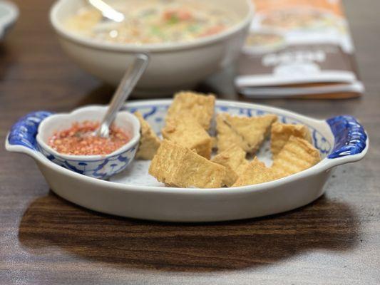 The crispy Tofu with sweet and sour and crumbled peanuts