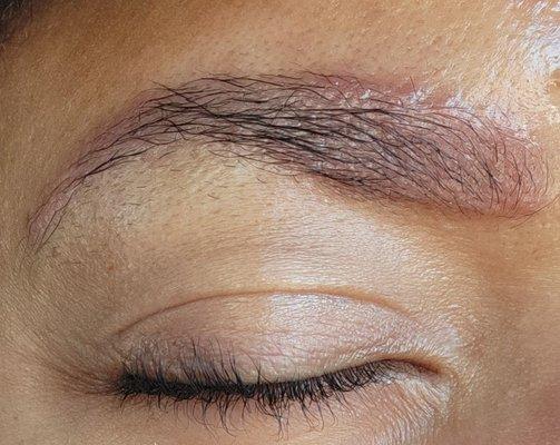 Irritation from over processed brow lamination.