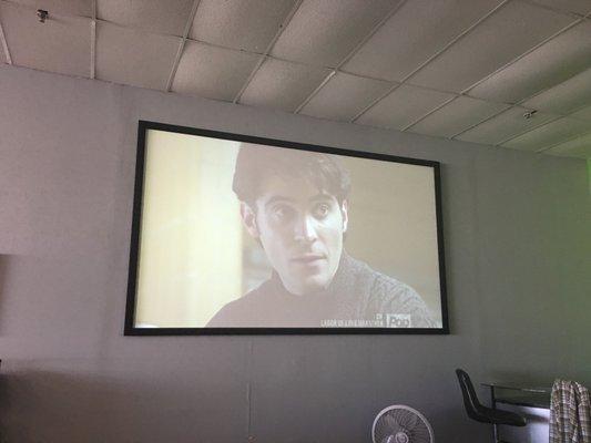 Big screen at The Vapor Shop