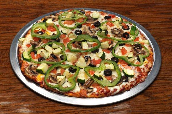 Rusty's Garden Special - Filled with freshly cut mushroom, bell pepper, tomato, onion, zucchini & black olive.