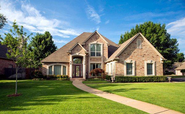 One of the many beautiful homes featuring our Single Hung, Double Hung and Picture Windows