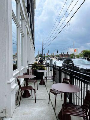 Front entrance with outdoor seating