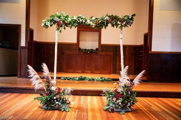 Arch provided and decorated by the Floral Loft for the Ceremony