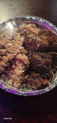 Stew chicken,  rice peas and cabbage