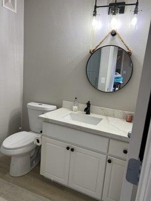 Guest bath. Installed new countertop toilet fixtures and shower