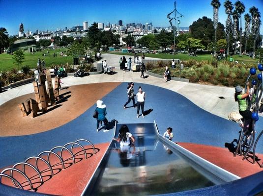 Awesome view of The City skyline as my daughter goes down the Wide Slide.