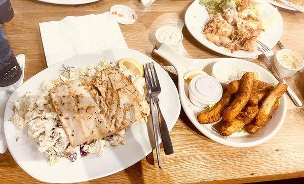 Garlic ahi on a bed of coleslaw with side partner calamari fries