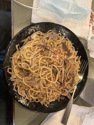 beef onion water chestnut bamboo shoots been sprouts yellow china noodles 2 garlic heavy on the garlic teriyaki and sesame oil