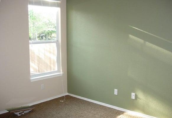 "Clary Sage," accent wall in a guest bedroom.