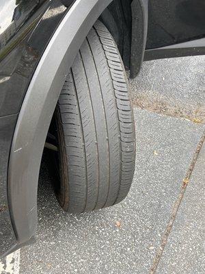 Bald tires on the front of the car