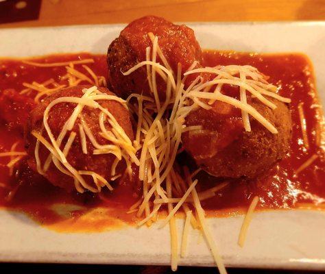 Arancini - goat cheese wrapped in risotto with tomato sauce you wish you could drink by the gallon!