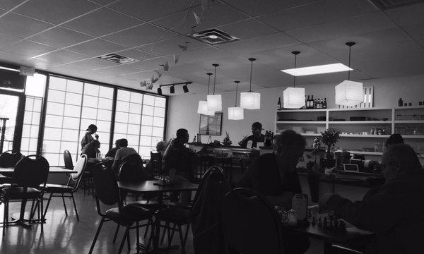 Open, bright restaurant with regular customers...yes, I realize the irony with the B/W pic and the bright description!