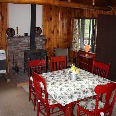 The cabins each offer a combination living/dining room and most have wood stoves.