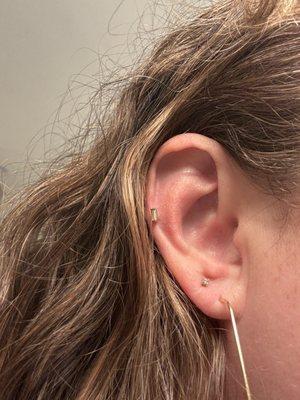 Mid-helix piercing, later switched out for an iridescent baguette