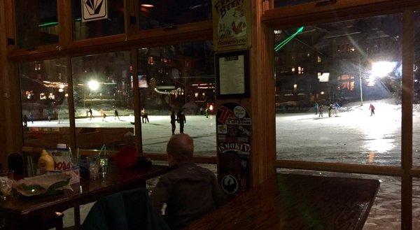 GREAT FULL SIZED WINDOWS overlooking the skating pond where pick-up hockey vies with dads training kids how to stay upright!