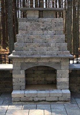 Carolina fireplace with wood storage boxes.