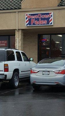 Outside- plenty of parking. Ask for Los- best barber