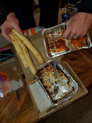 Chicken wings burned into the pan, cheesy bread with no cheese, pasta burned around edges. Good flavor though.