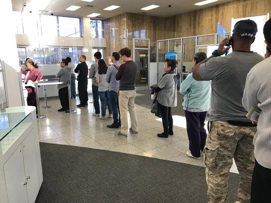 Long lines 20 deep (this is half the line) with only two tellers working on a Friday at 4pm.