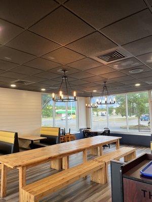 Inside dining area with locally-made tables