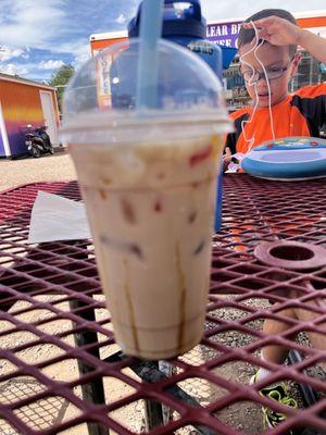 Okinawa milk tea with rainbow jellies.