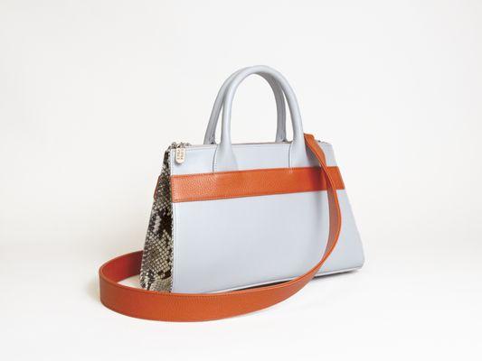 Our brand spankin' new Day Bag, the Courante! It is in Dove Gray, Soft Grain Orange, and our new leather, Embossed Snake Skin Shadow