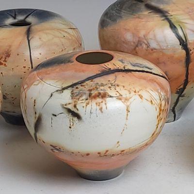 Small vessels. Painted with flame and vapores. Polished smooth white clay.