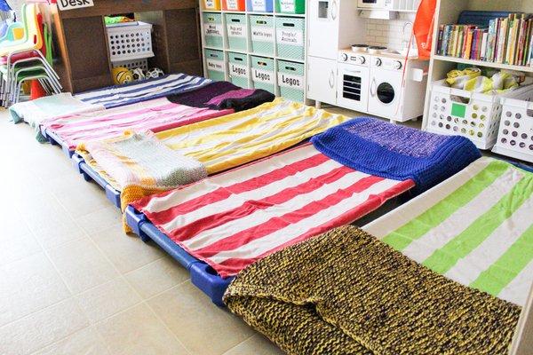 During nap time, children have their own cot to sleep on along with their own sheet and hand-made crocheted blanket.