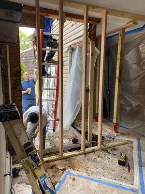 Kitchen wall completely ripped out yesterday - open to the outside.