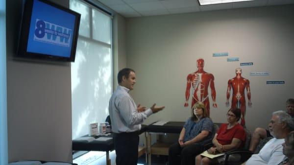 Dr Kambeitz giving a presentation about wellness