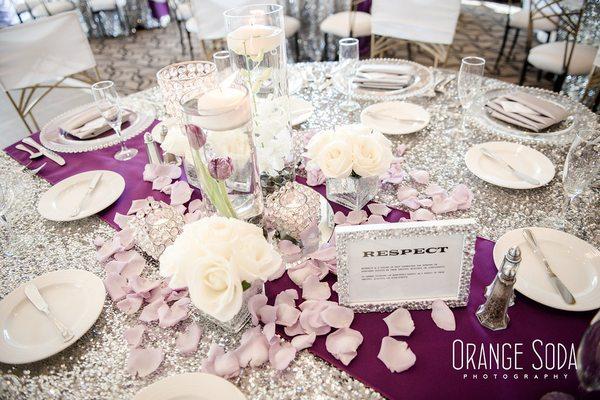 table linens and floral and bling chargers