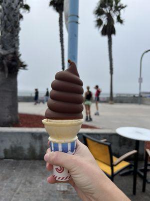 Chocolate and vanilla swirl soft serve ice cream, dipped in a chocolate shell.