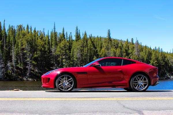 A Jaguar F-Type in front of Lake Peterson