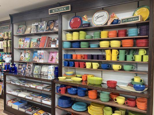 Kitchen stuff included cookbooks, Fiestaware, Lodge pans, kitchen gadgets, etc.