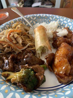 Broccoli beef, chicken lo mein, egg roll and orange chicken (take out). Yum!