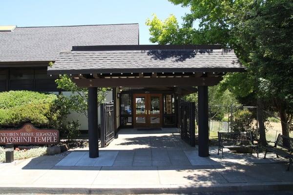 Front gate, opened, leading to the doors into the sanctuary.