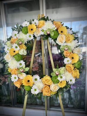 Sunshine Tribute - Bringing a gentle touch of brightness, this arrangement of yellow and white blooms captures the warmth and compassion sha